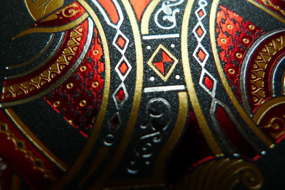 Detail by Oath Playing Cards. Many luxury decks use metallic foiling on the artwork.