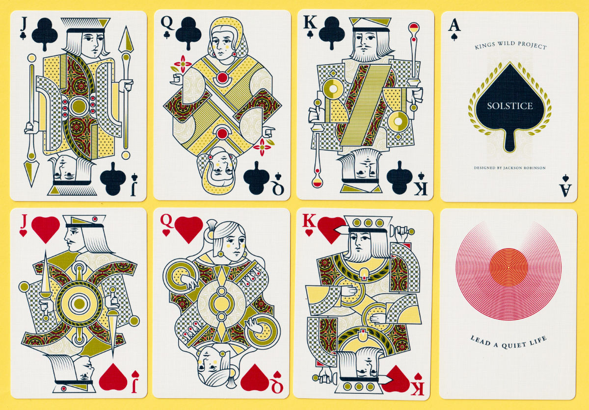 Clubs and hearts courts beside the Ace of Spades and a motto card