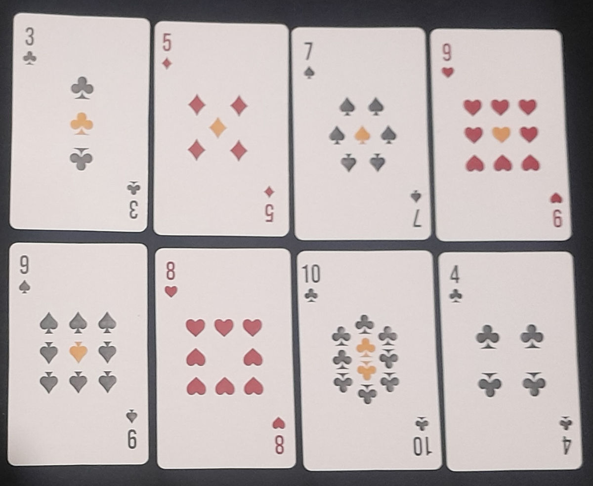 Number cards from the four suits of the Zewd Historical Deck.