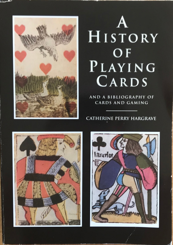 Cover of A History of Playing Cards by Catherine Perry Hargrave, with two illustrated playing-card figures.