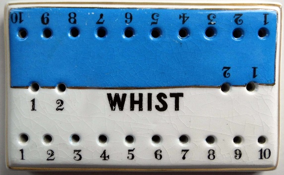 A ceramic whist marker made by Taylor Tunnicliffe in around 1890