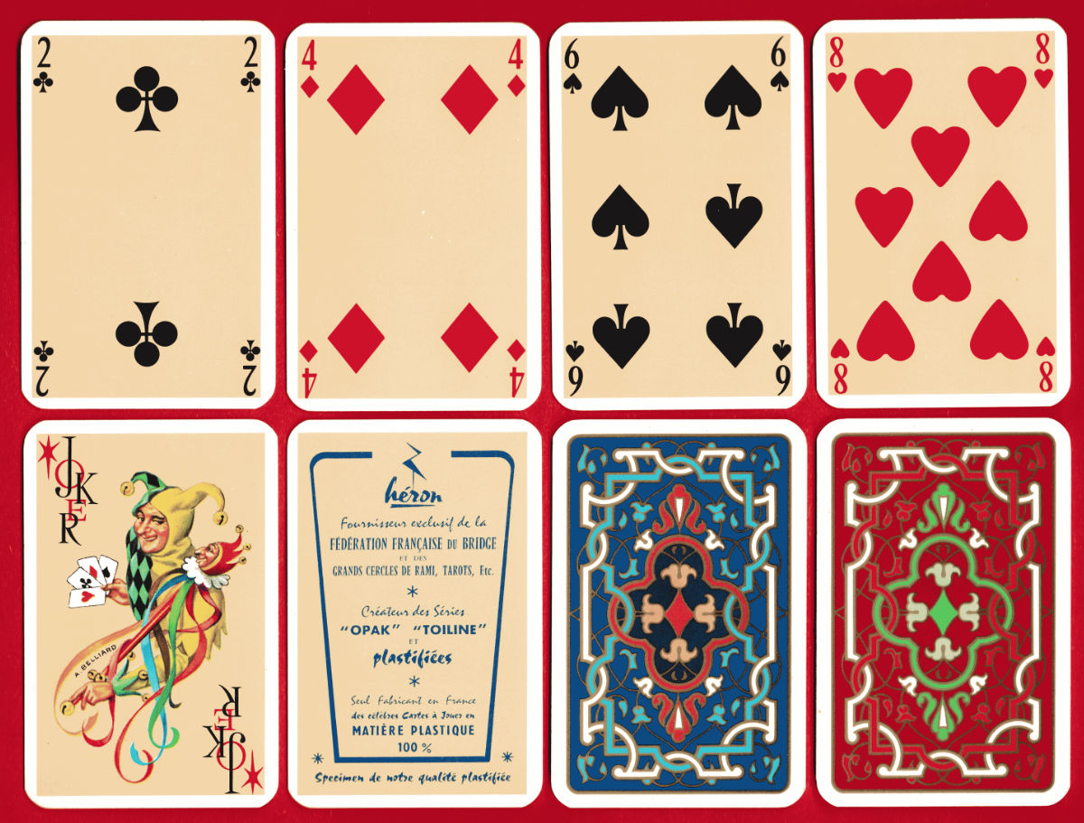 Number cards, joker, Héron advertising card, and blue and red ornate backs from the Chambord pack