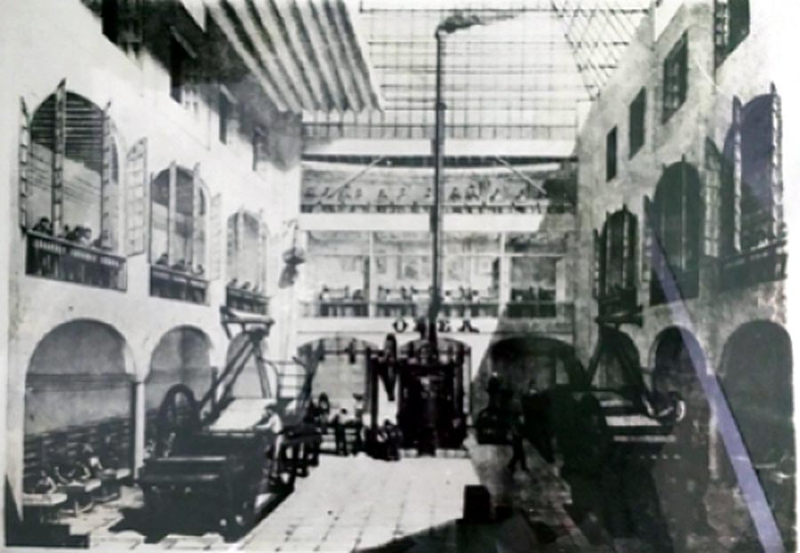 interior view of the Olea playing card factory showing steam-powered presses and workers engaged in the various stages of manufacture, late 19th century