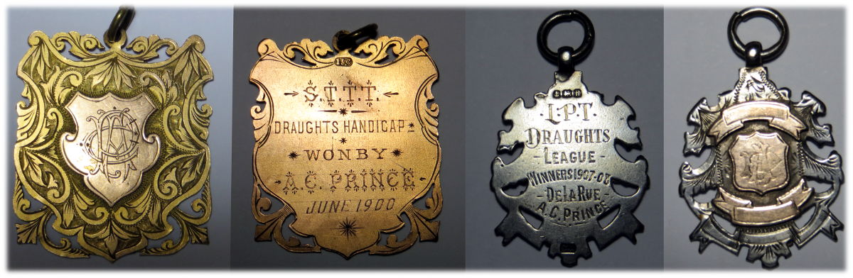 2 draughts league medals awarded to Arthur Charles Prince, who worked for De la Rue