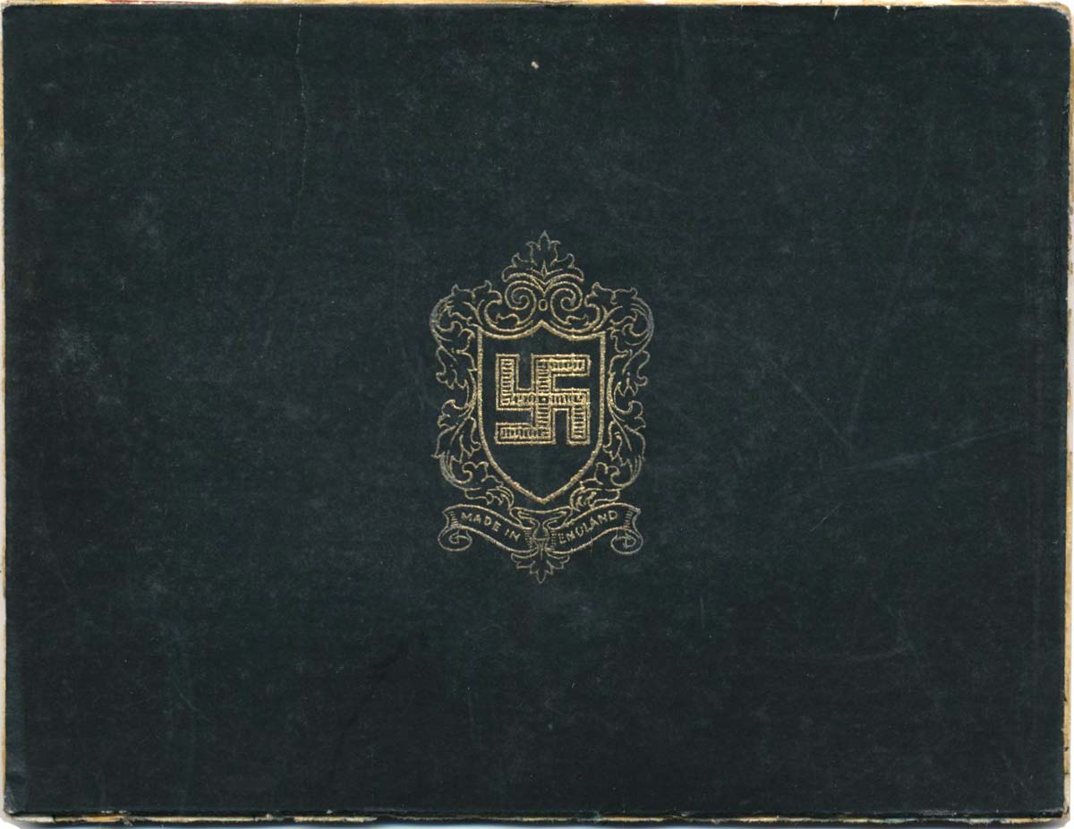 inside of the lid of a box produced by Thomas De La Rue with a swastika design, c.1934