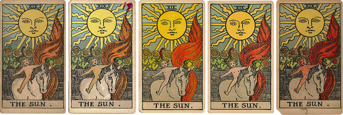 Different versions of 'The Sun' from early editions of the Rider Waite Tarot Different versions of 'The Sun' from early editions of the Rider Waite Tarot