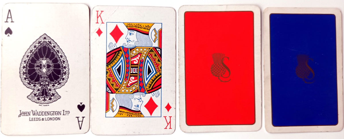 Waddington’s Faux book set containing four packs of playing cards and four “bridge markers”, 1930s